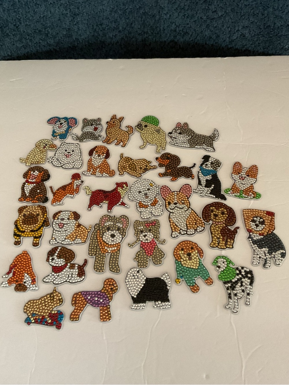 30 Assorted Sparkly Dog magnets. Multicolor and cute. Great for any fridge.